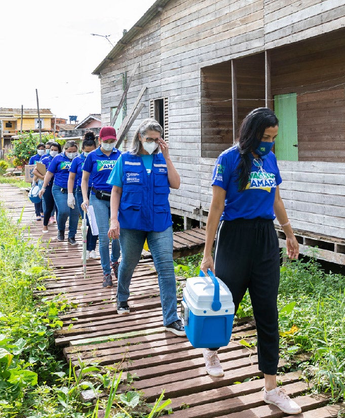 Health workers visiting a remote village in Brazil