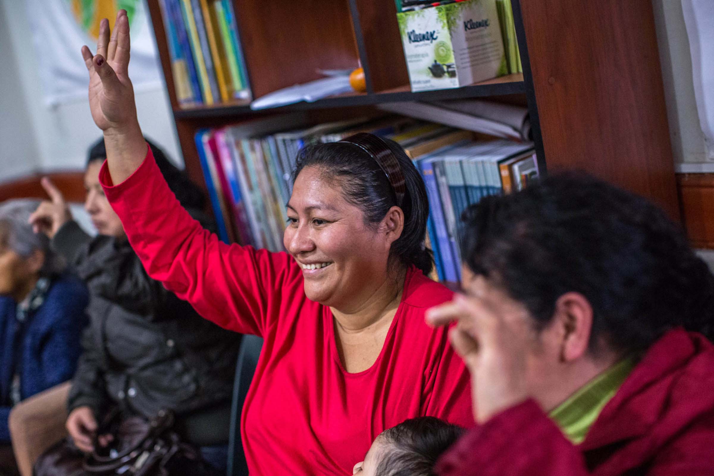 woman in a community meeting