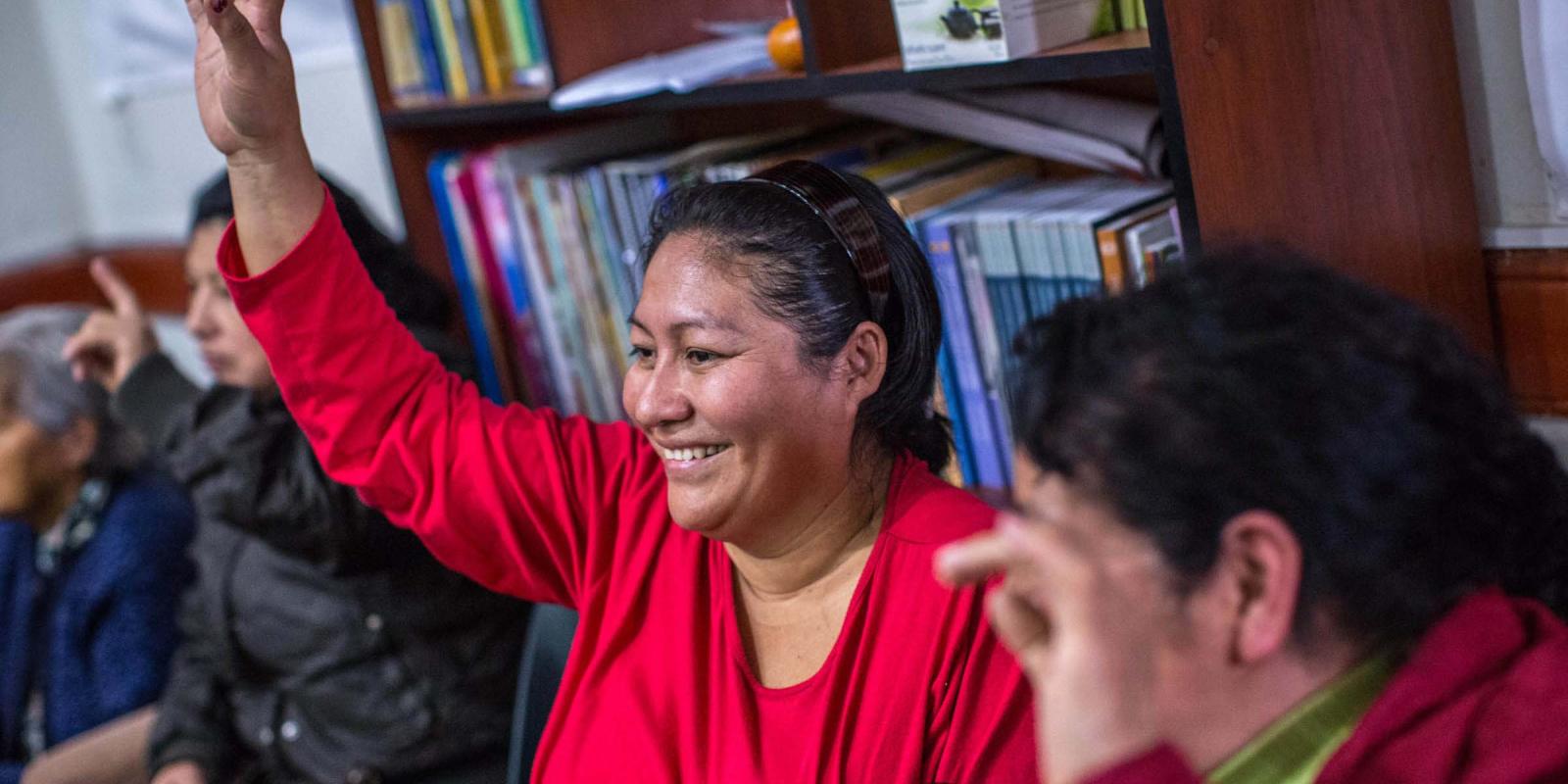 woman in a community meeting
